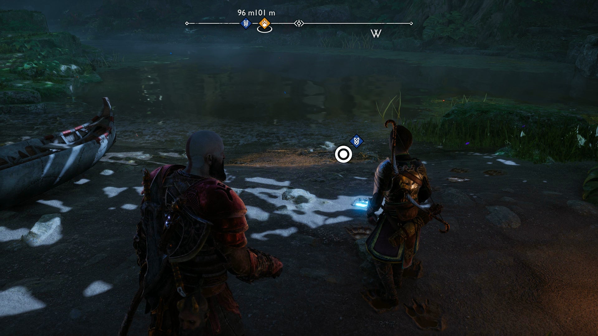 Kratos and Atreus examining some tracks in God of War Ragnarok - 5