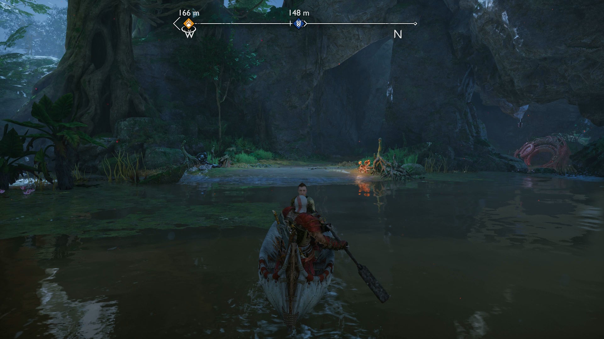 Kratos and Atreus rowing a boat in Vanaheim in God of War Ragnarok - 6