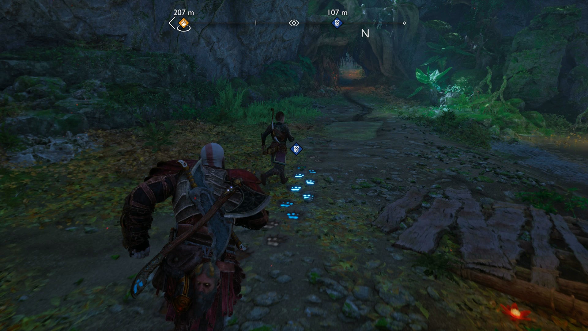 Kratos and Atreus following monster tracks in God of War Ragnarok - 7