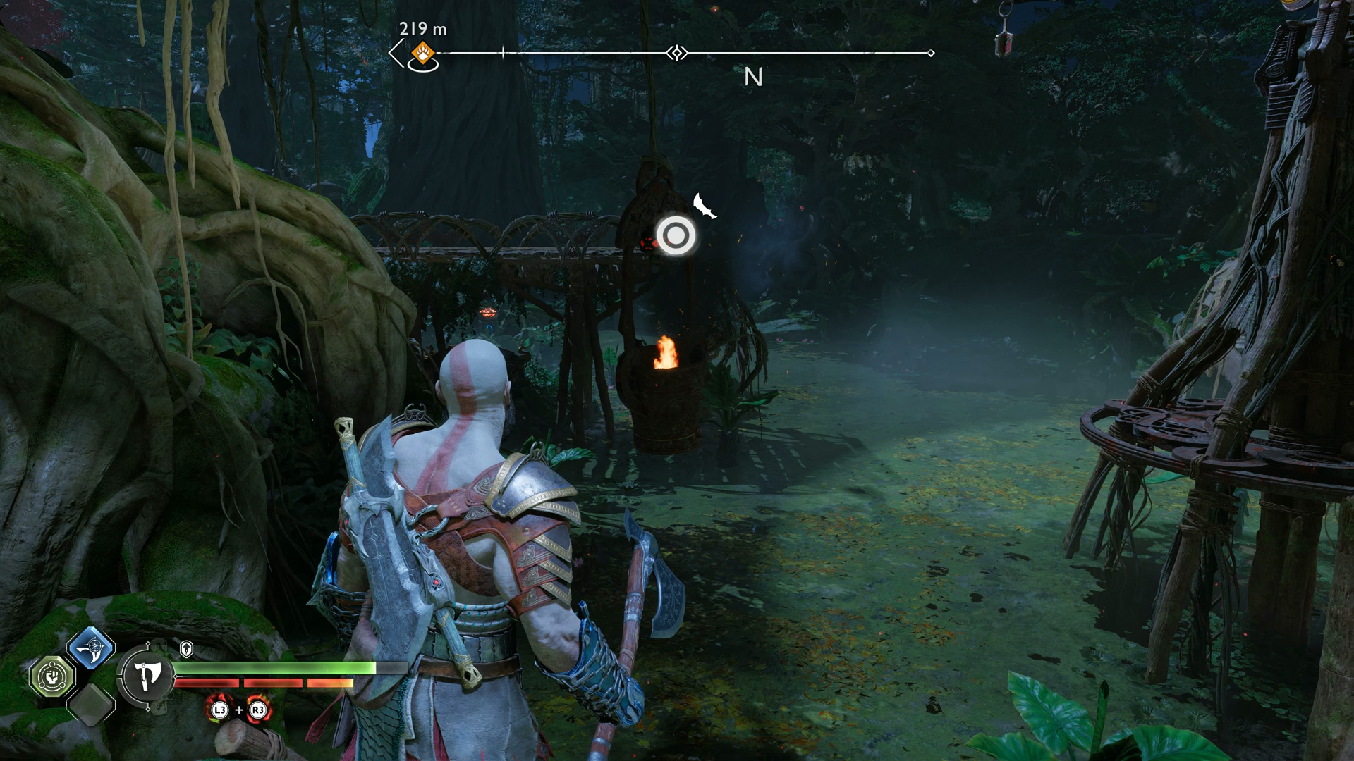 Kratos lighting the second brazier for the Nornir Chest in The Abandoned Village in God of War Ragnarok