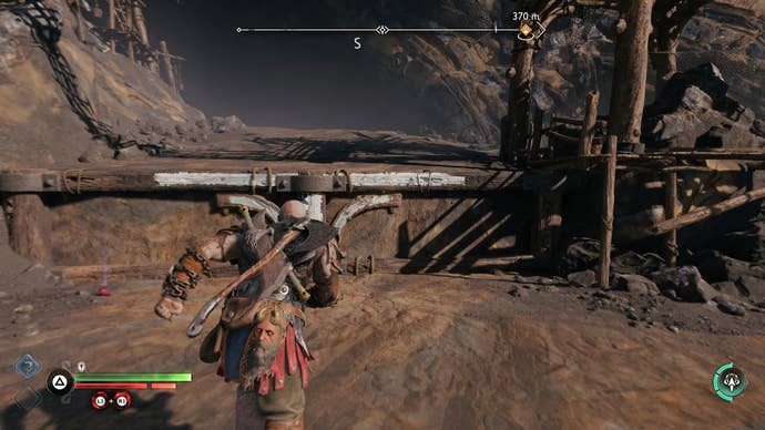 Kratos climbing a ledge to get into The Applecore in God of War Ragnarok