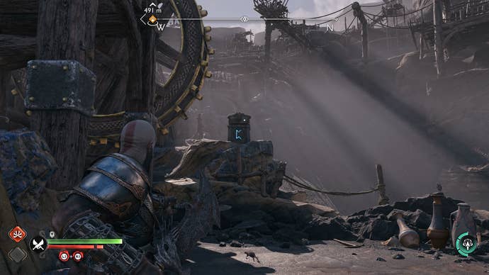 Kratos solving puzzles in Jarnsmida Pitmines in God of War Ragnarok