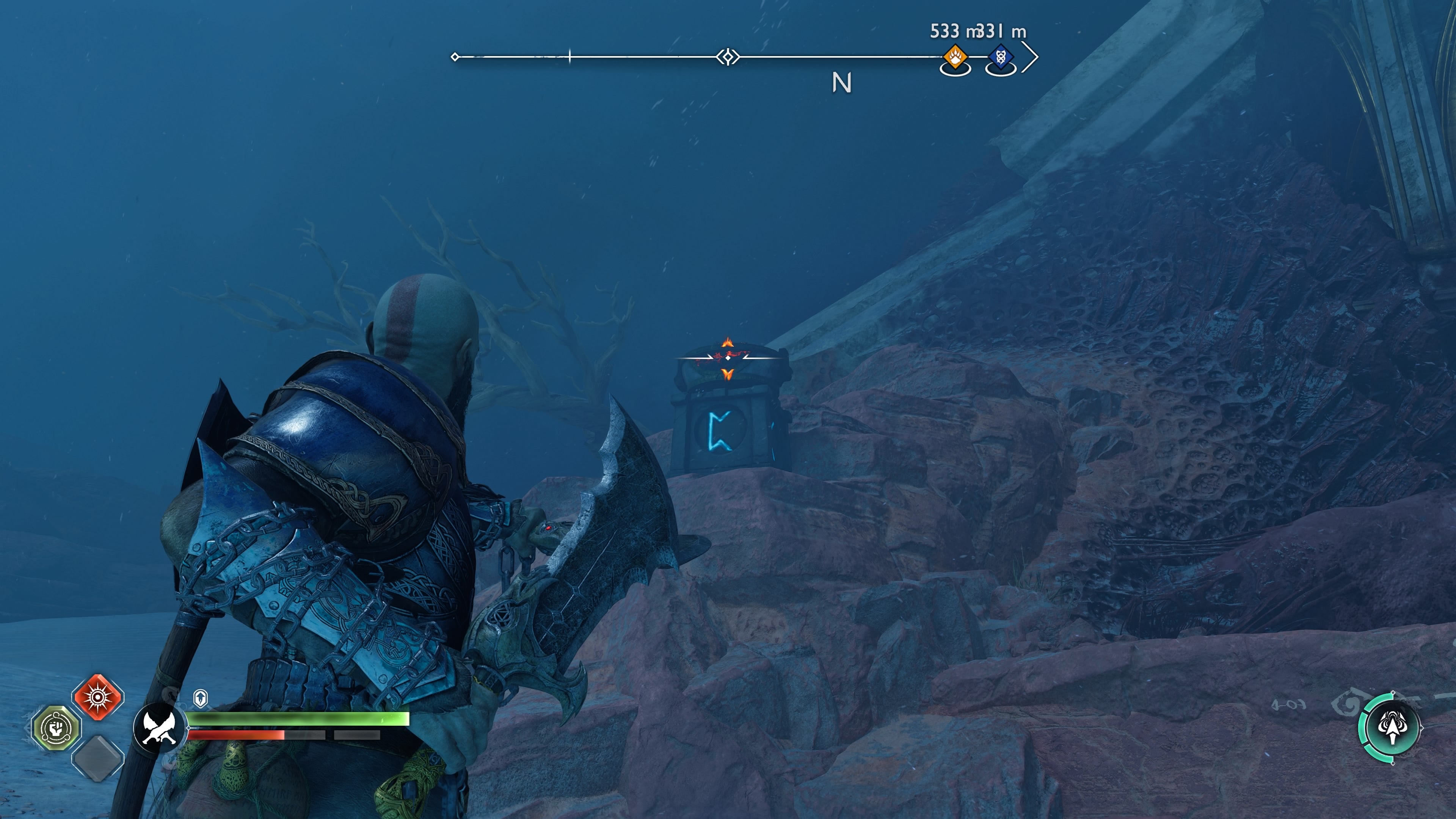 Kratos looking up at the first brazier in The Barrens in God of War Ragnarok