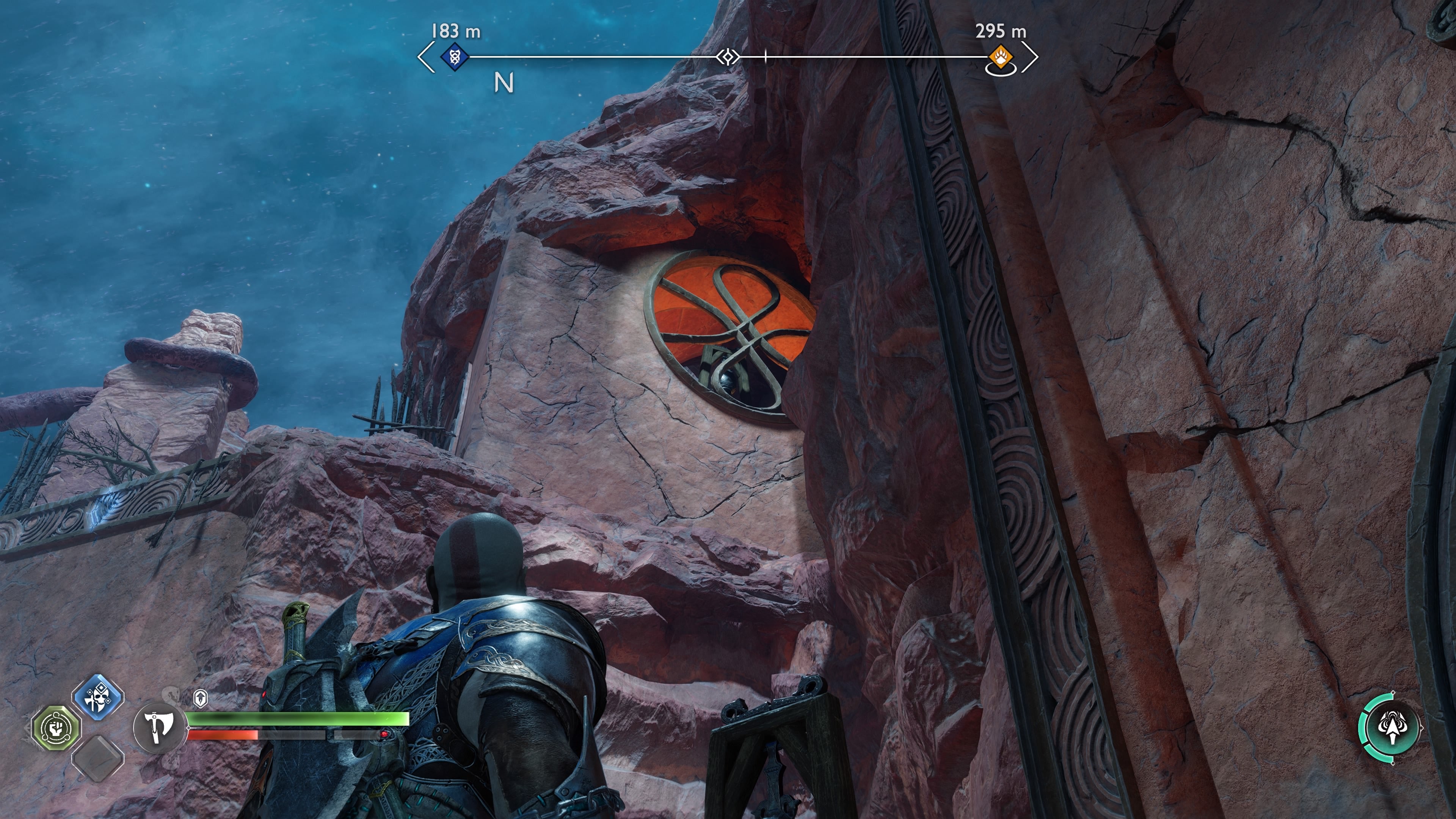 Kratos looking up into a window where he can see the third Nornir Bell in The Below in God of War Ragnarok