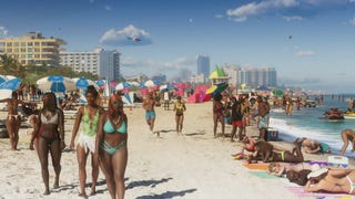 Crowds walk along the Vice City beach in swimwear in this GTA 6 screenshot.