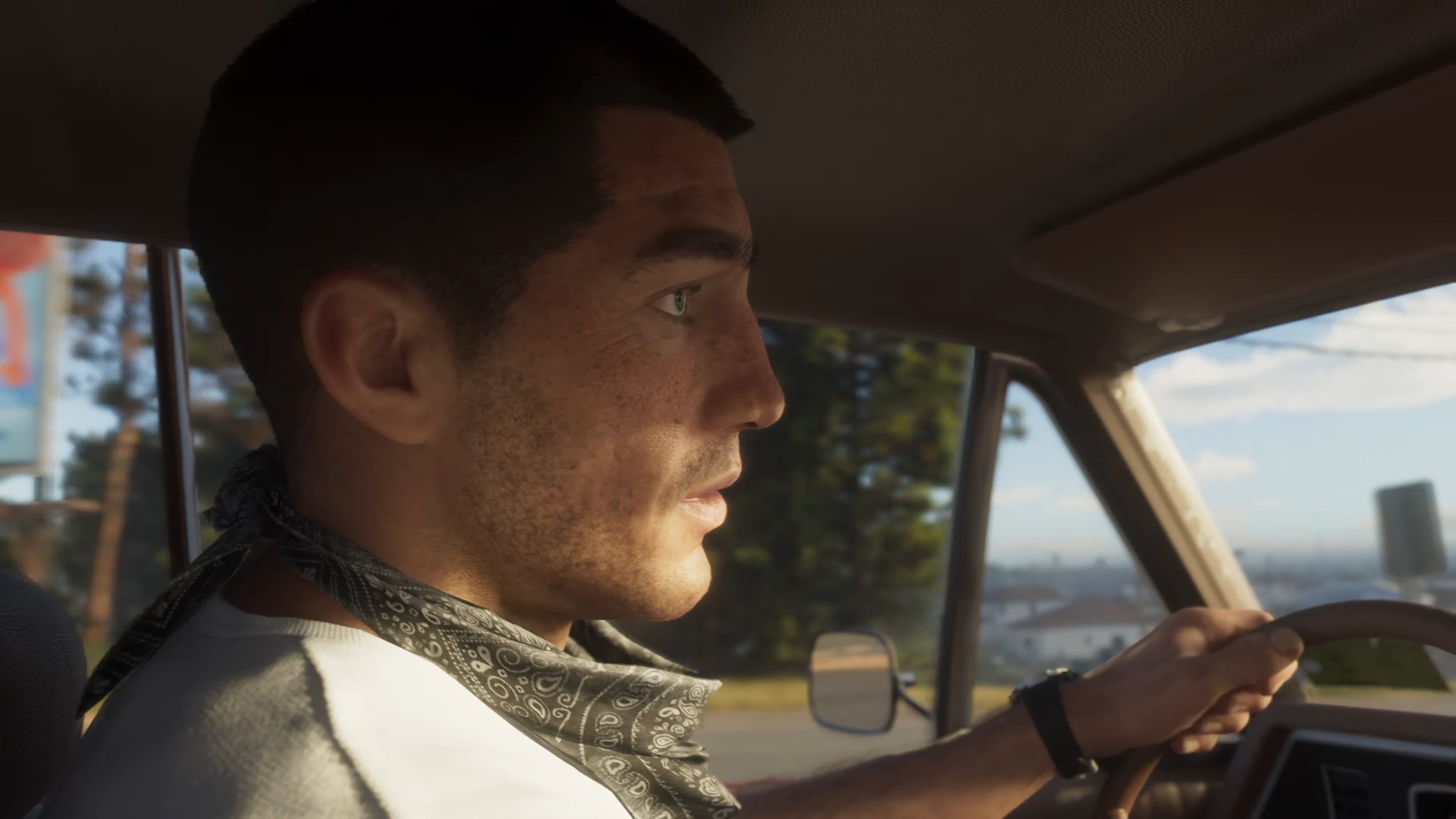 GTA 6&rsquo;s male protagonist behind the wheel of a car.