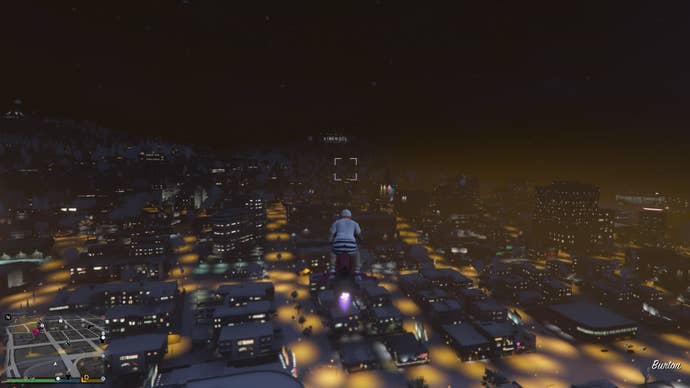 Flying over a snowy Los Santos in GTA Online.