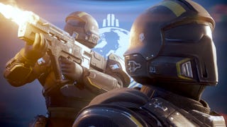 Helldivers characters in costumes, one firing a weapon, stand in front of a blue globe logo.