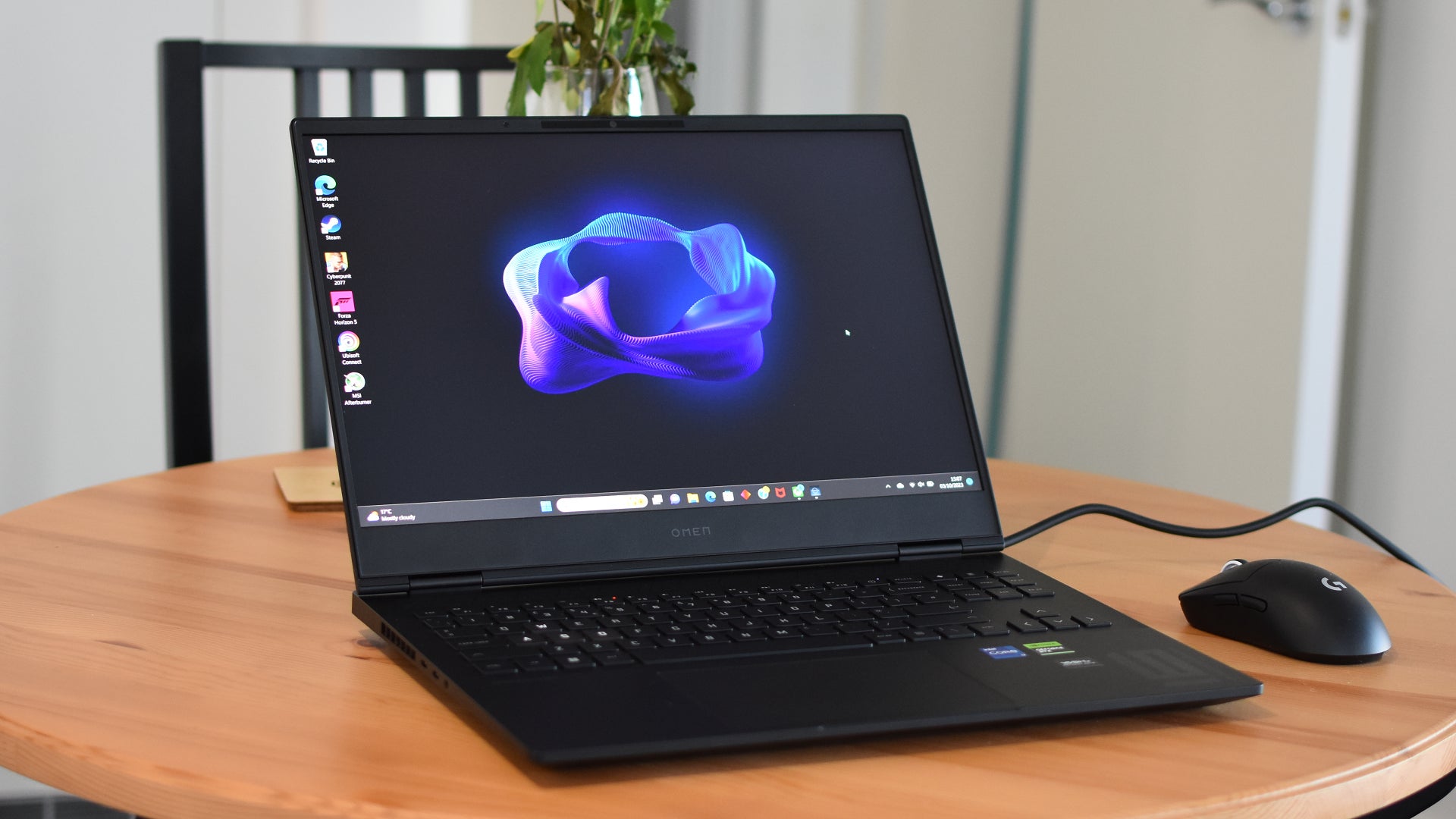 The HP Omen Transcend 16 gaming laptop on a table. - 1