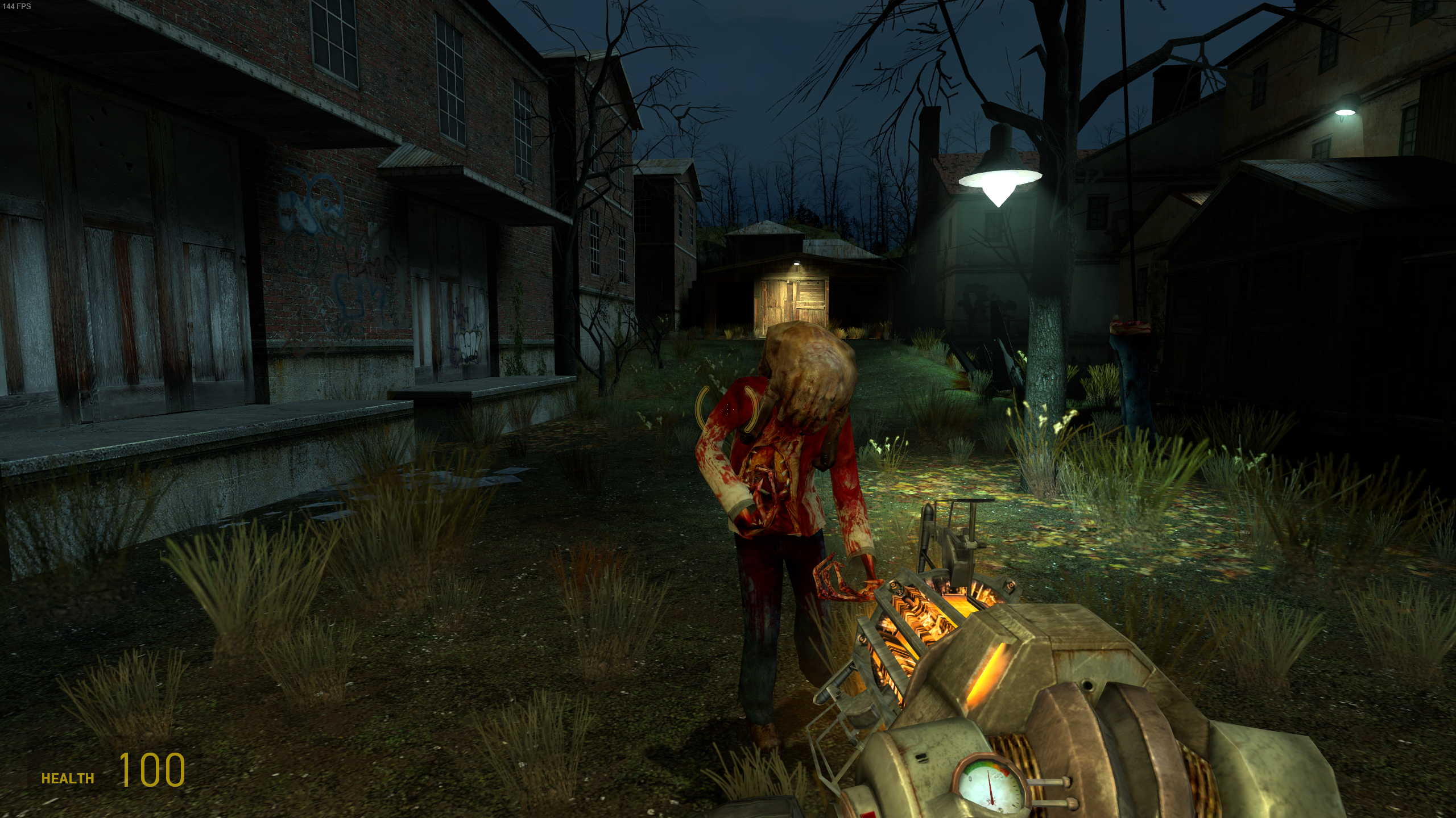 A headcrab zombie attacks from underneath a tree in Half-Life 2.
