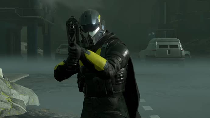 Helldivers 2 trailer screenshot showing close up of a Helldiver character in armour aiming a gun