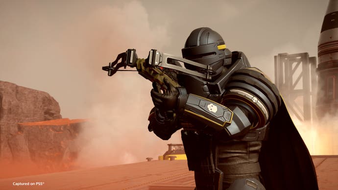 Helldivers 2 player holds up a crossbow