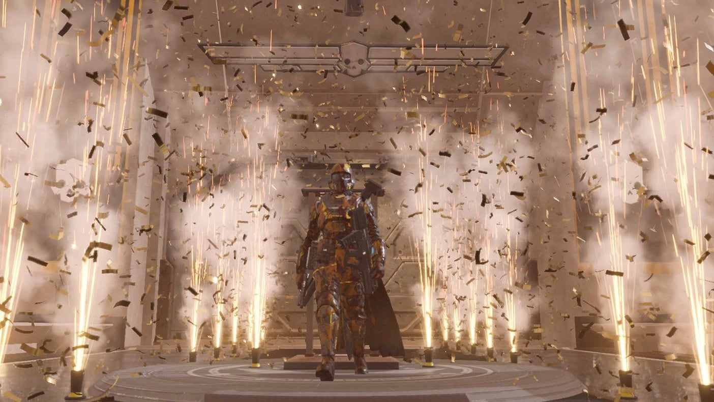 Helldivers 2 screenshot showing a helldiver walking proudly along as confetti rockets erupt around them