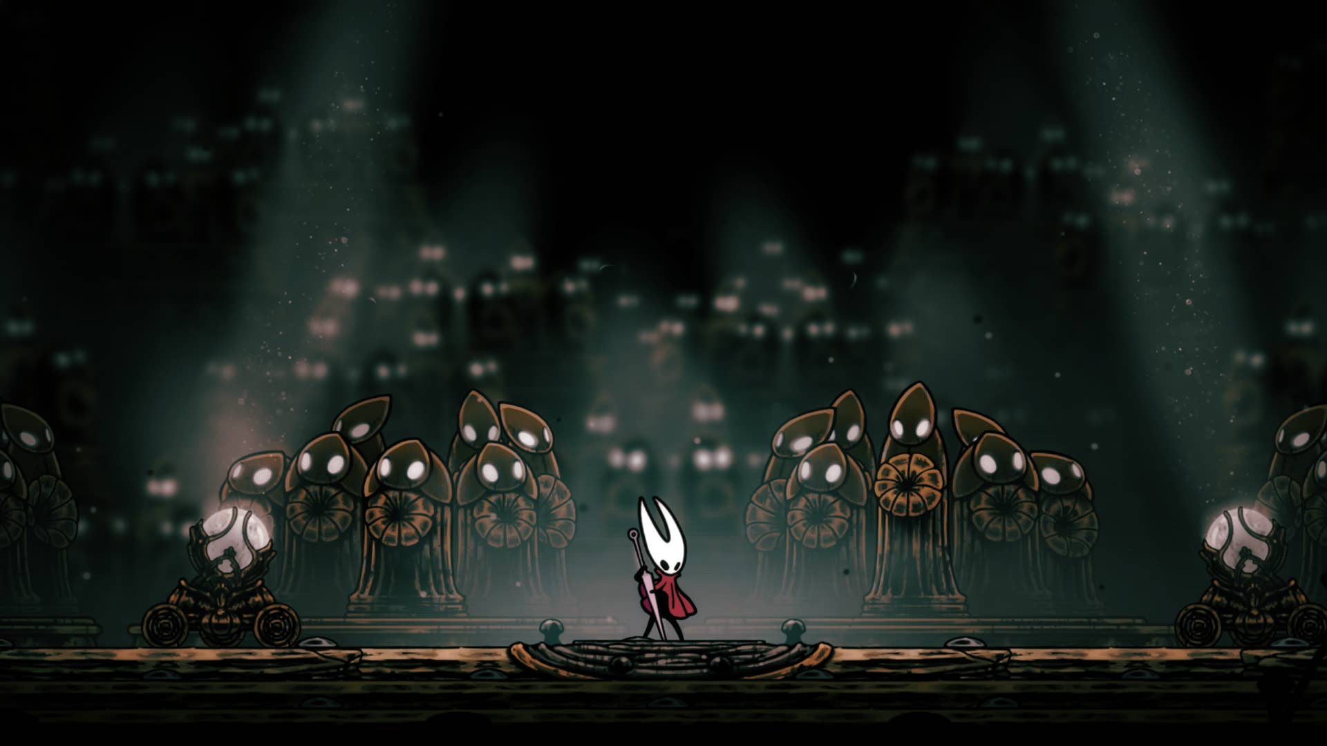 The Hornet plays Needlin in front of the Hollow Knight: Silkson statue choir.