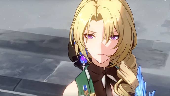 close up of cocolia looking up into the distance, on a snowy background