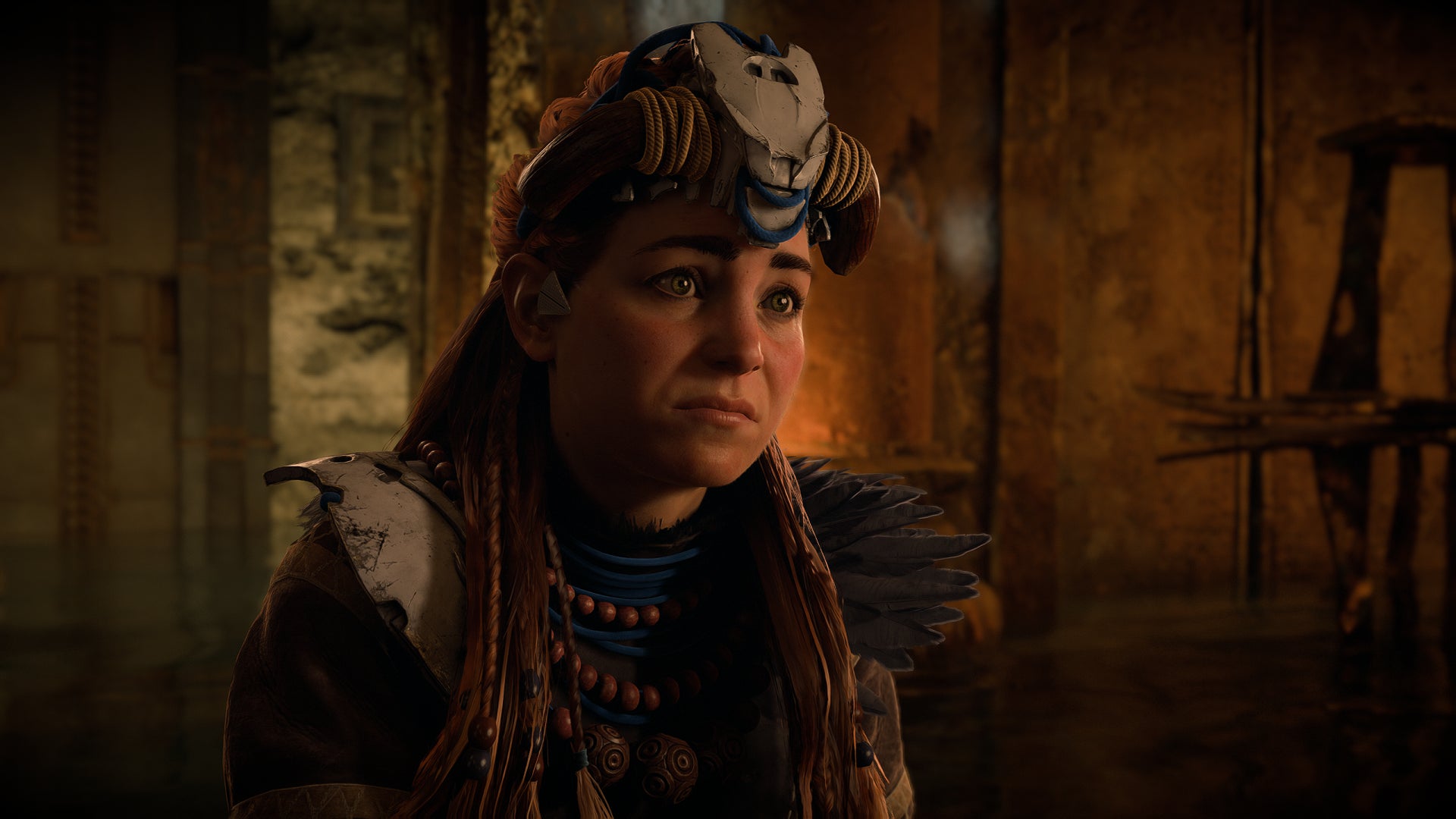 In Horizon Forbidden West, Aloy pulls a thoughtful face while discussing an improvised rebreather design. - 1