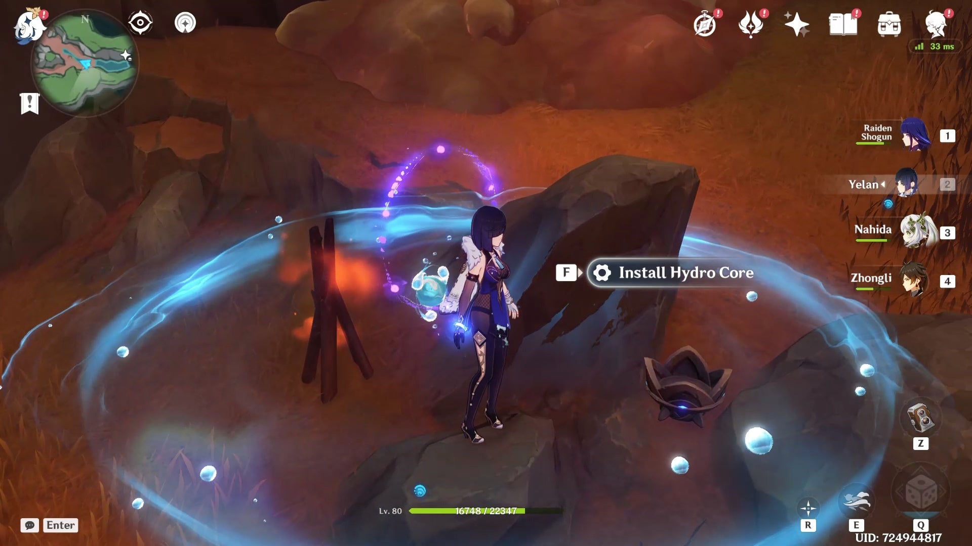 Yelan standing between a fire and totem with a blue circle around her.