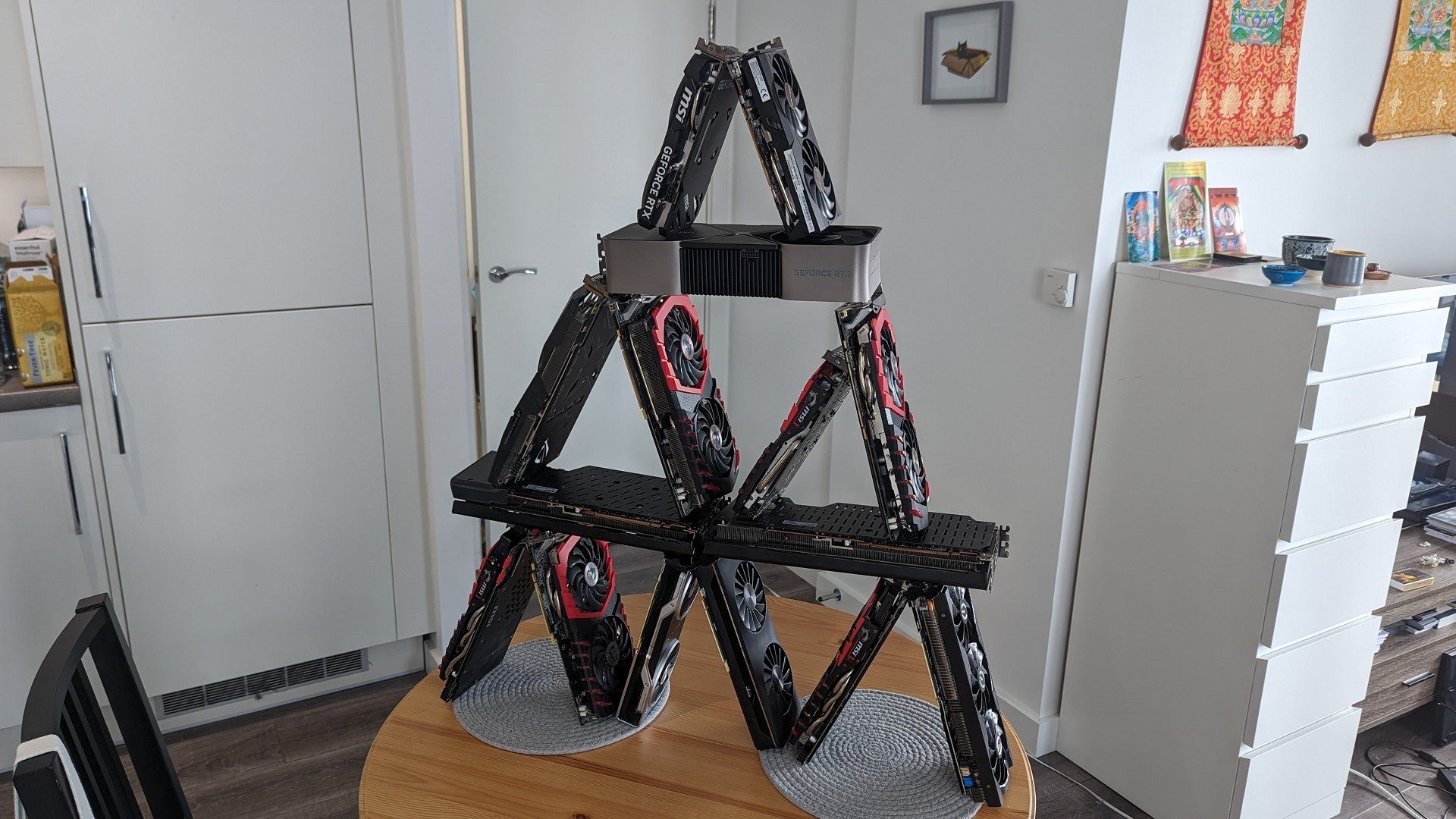 A completed house of graphics cards, standing majestically, and definitely unlikely to topple over at the slighest breeze.