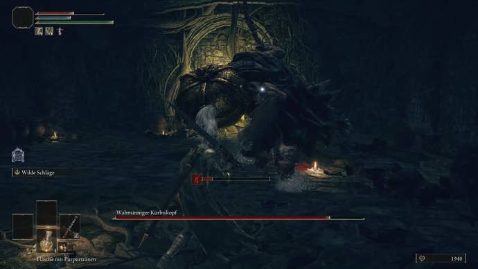 Fighting the Mad Pumpkin Head boss in the Waypoint Ruins in Elden Ring.
