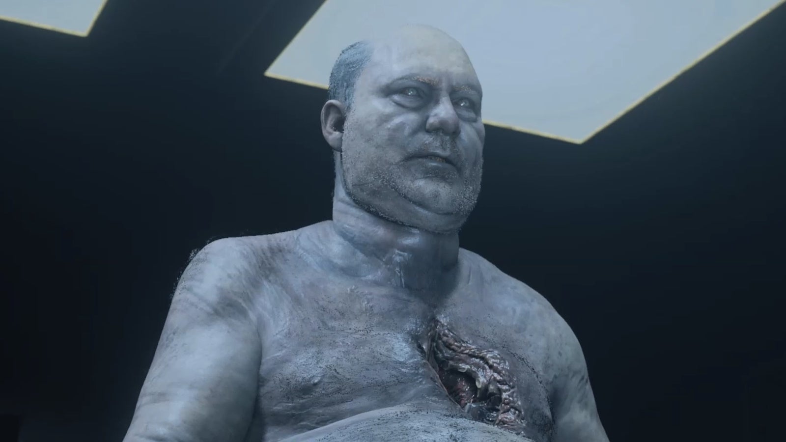 close up of nightingale's pale corpse sitting up in an autopsy room with his eyes open and a hole where his heart should be