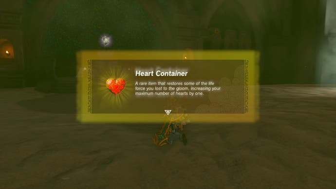 Link receiving a Heart Container as a reward for defeating the Queen Gibdo boss in The Legend of Zelda: Tears of the Kingdom.