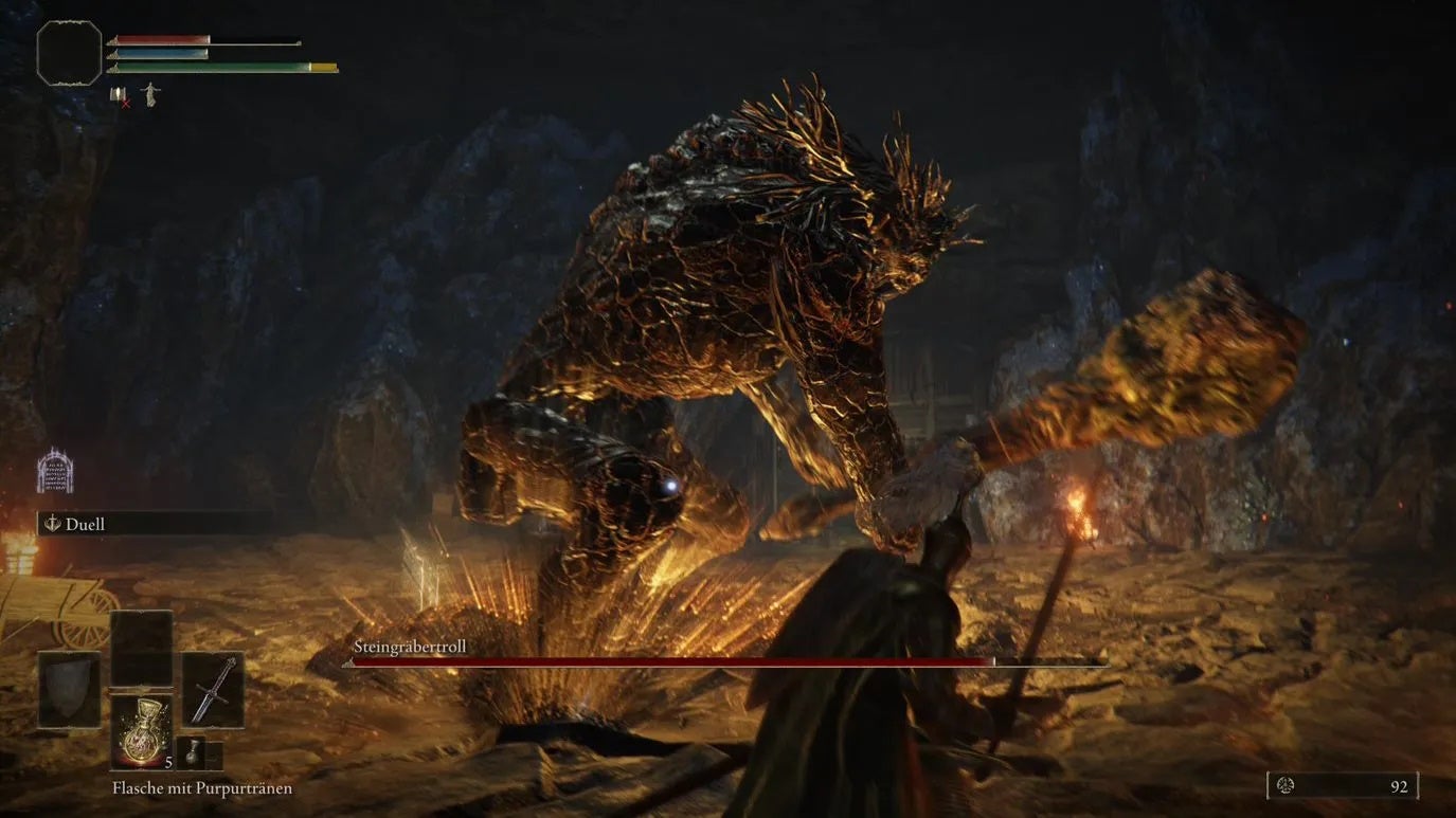 Fighting the Stonedigger Troll in the Limgrave Tunnels in Elden Ring, after the boss has hit the ground with its club.