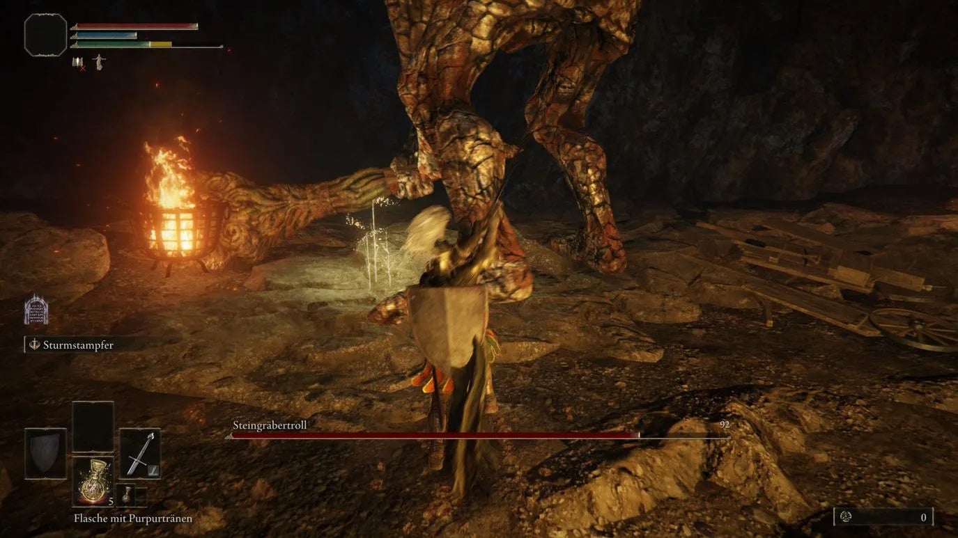 Hitting the shins of the Stonedigger Troll in the Limgrave Tunnels in Elden Ring.