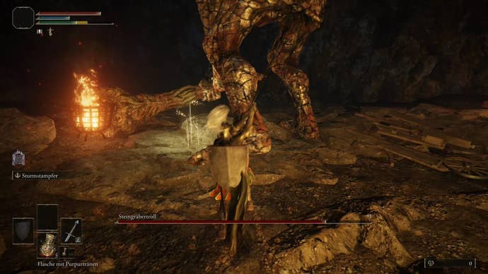 Hitting the shins of the Stonedigger Troll in the Limgrave Tunnels in Elden Ring.
