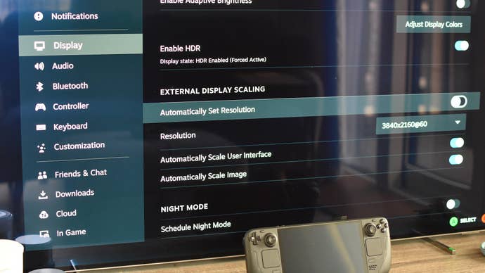 Step 3 of how to connect a Steam Deck to a TV with a docking station: Enter the Steam Deck’s Display settings, uncheck ‘Automatically set resolution’, and select your TV’s resolution.