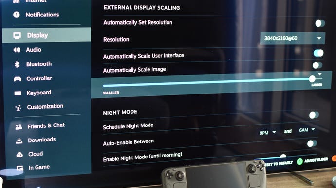 Step 4 of How to connect a Steam Deck to a TV with a docking station: uncheck 'Automatically scale image' and adjust the slider until the picture fits the screen.