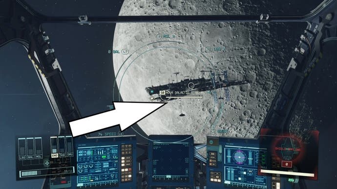 a white arrow pointing to the docking prompt on a space station