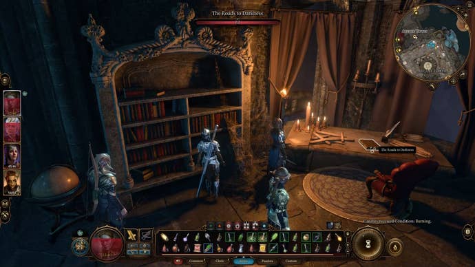 Cursor on the road to darkness book on top of a desk lit by candles.