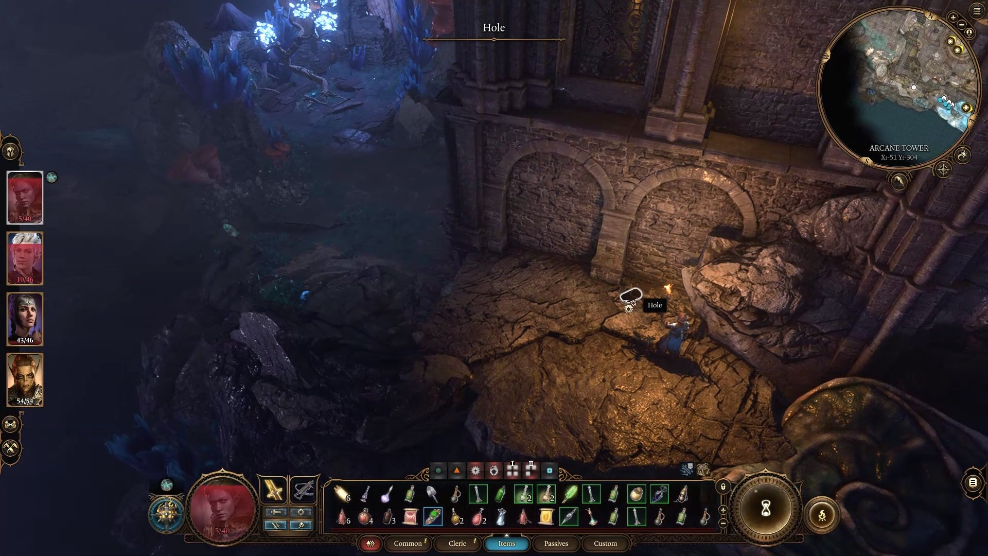 Cursor on a hole in a dark area lit by a torch.