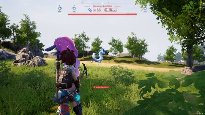 Alpha Pal Chillex in the distance on a grassy field in Palworld.