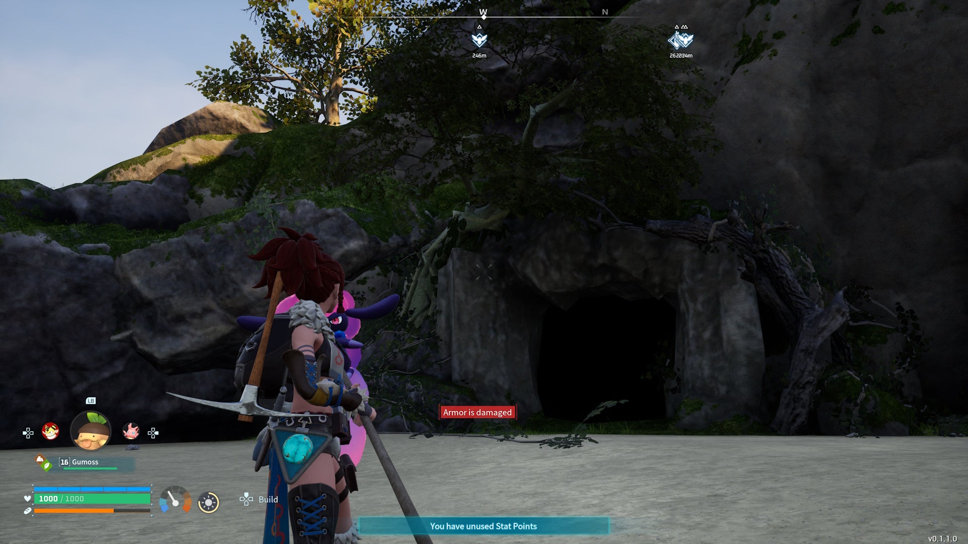 A dark cave on a beach shoreline in Palworld.