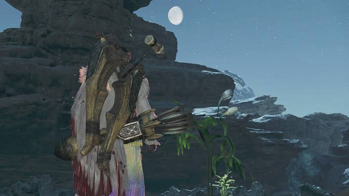 Standing by an Ephemeral Blossom in Monster Hunter Wilds while the Wanning Gibbous moon cycle is appearing.