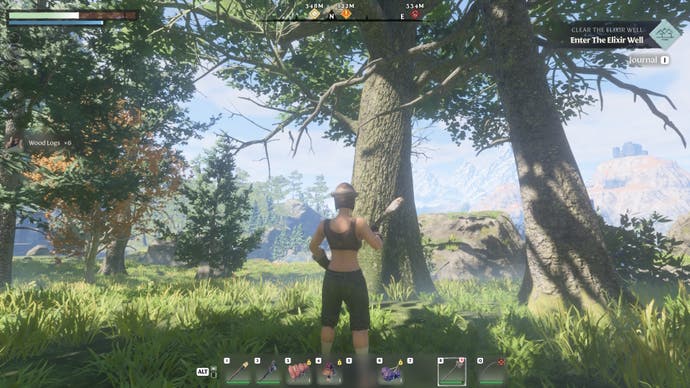 Standing in front of a medium tree with an axe in hand in Enshrouded.