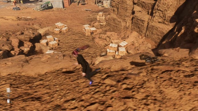 Eve running about a large group of wooden boxen in The Desert area of Stellar Blade.
