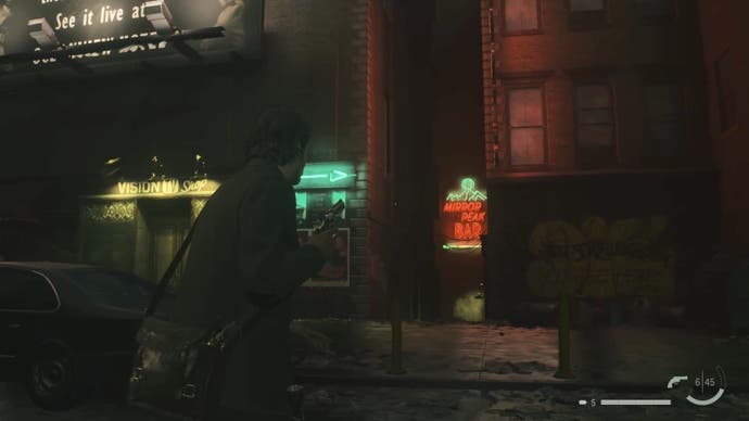 Alan with his revolver raised looking down an alleyway with a red and blue sign reading 'mirror peak', with a green arrow pointing to the alley beside a shop selling televisions