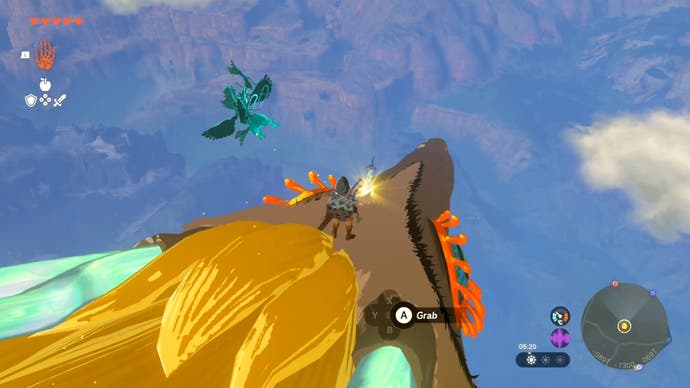 Link standing on top of the Light Dragon as it flies through the skies in The Legend of Zelda: Tears of the Kingdom.