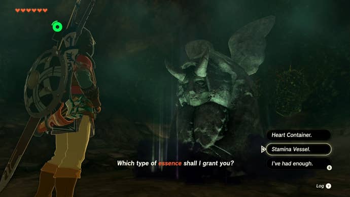 Link interacting with a statue at Looking Landing, which lets the player exchange heart containers for more stamina.