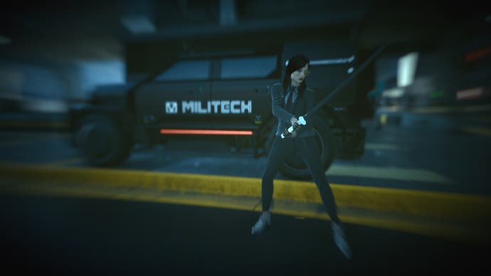 photo mode with a sandevistan filter which blurs slightly and adds a blue hue, with photo showing a female V with a katana in hand in front of a large militech car