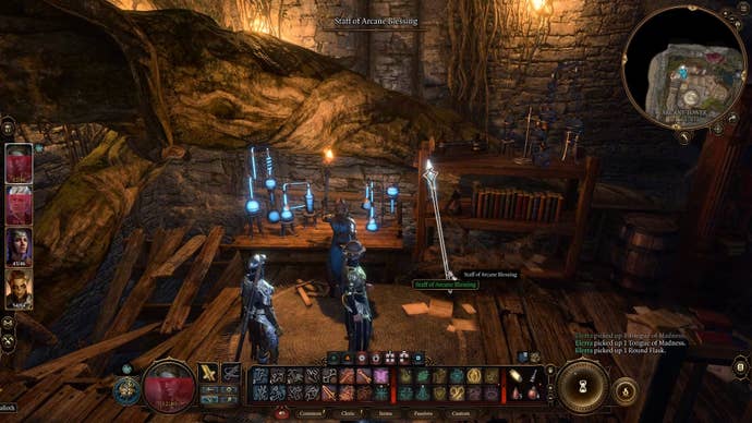 Cursor on the staff of arcane blessing which is next to a desk and bookcase.