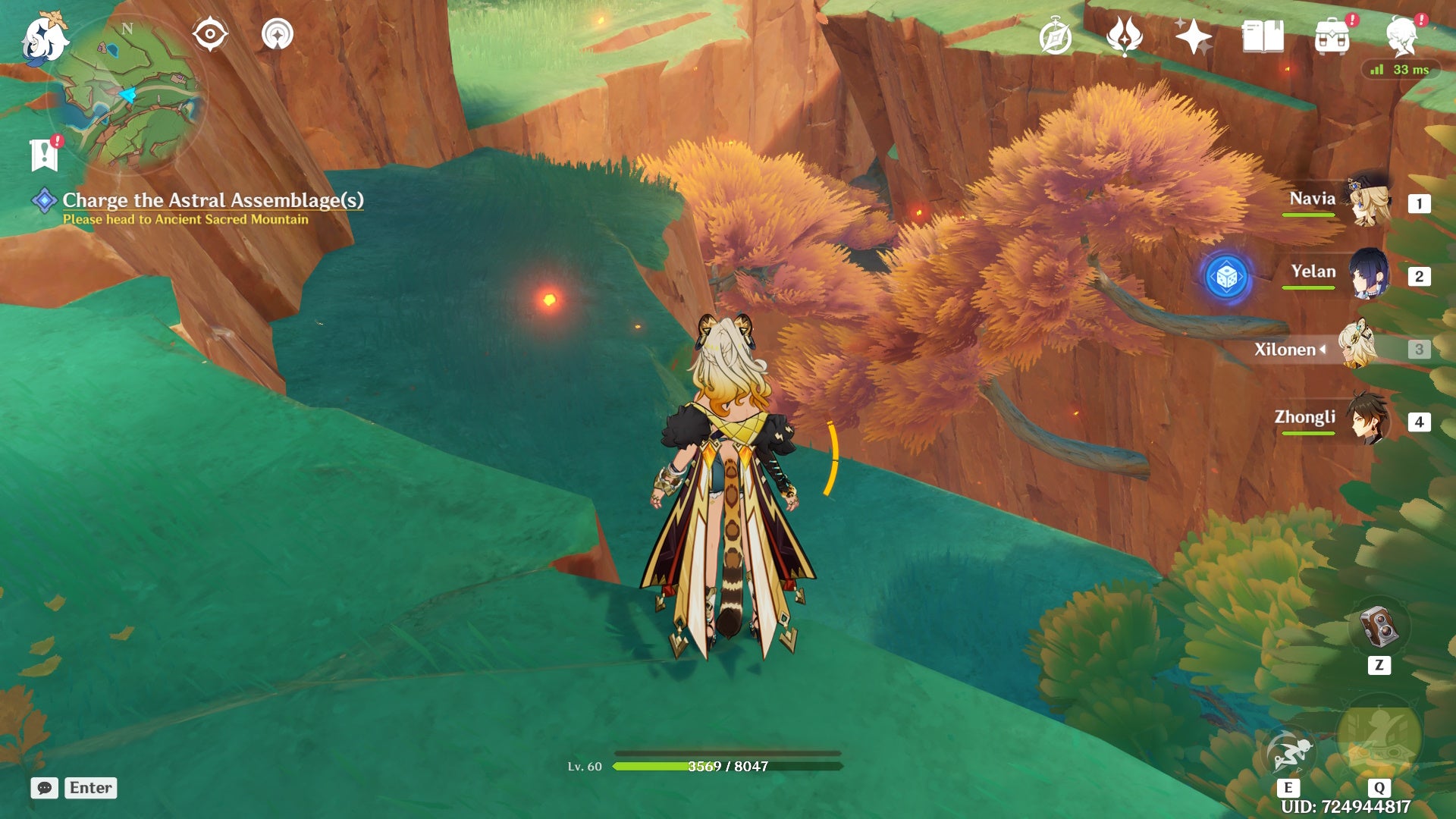 Xilonen looking at a chasm in Natlan in Genshin Impact.