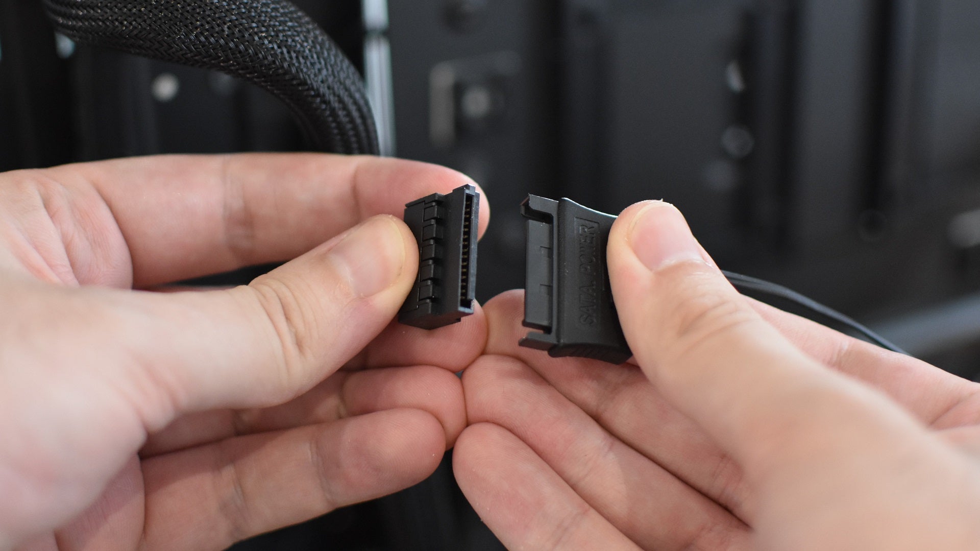 Step 7 of how to install a CPU liquid cooler: connect any remaining cables, such as SATA power cables and RGB cables.