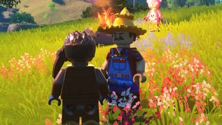 cropped view of talking to lego hayseed in fortnite lego while standing in front of a campfire in a grassy area
