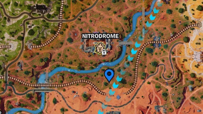 A blue pin indicating the location of a dirt pot on the Fortnite map.