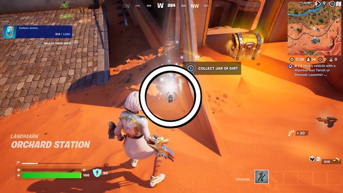 A white circle showing a pot of dirt buried in the sand in Fortnite.