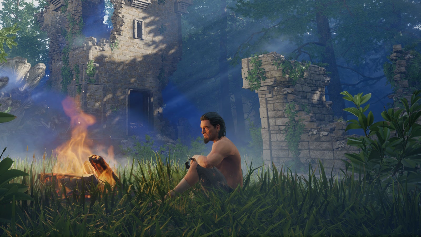A shirtless lone male character sitting by a lit campfire in a ruin in Enshrouded.