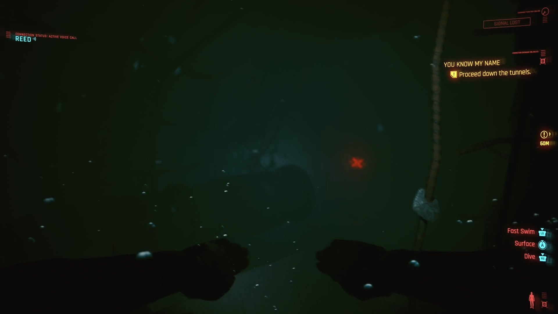 first person view of swimming underwater with a red mine in the distance